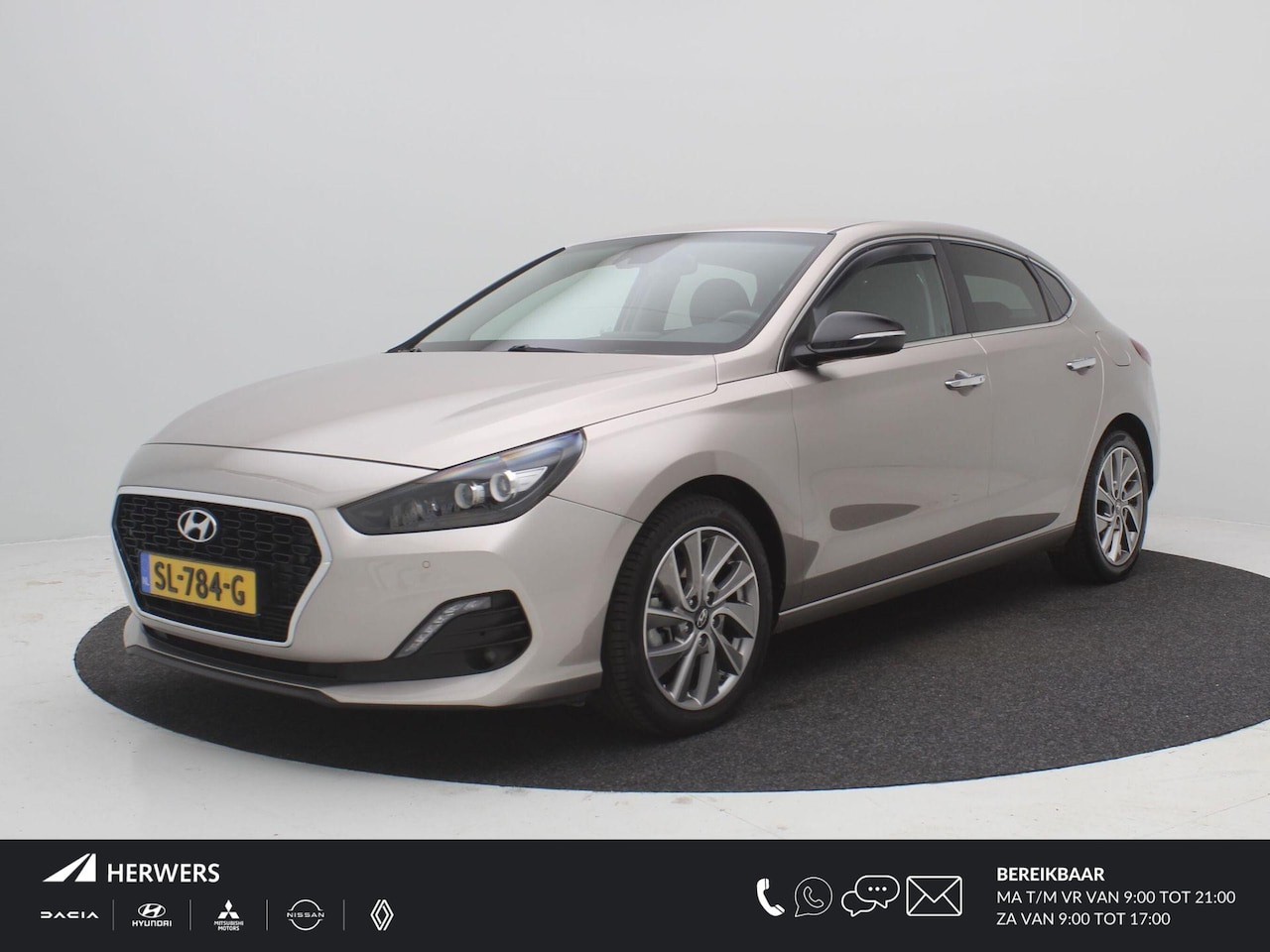 Hyundai i30 Fastback - 1.4 T-GDI 140PK Premium / Navigatie / Cruise Control / 17" LMV / Airco Climate Control / K - AutoWereld.nl