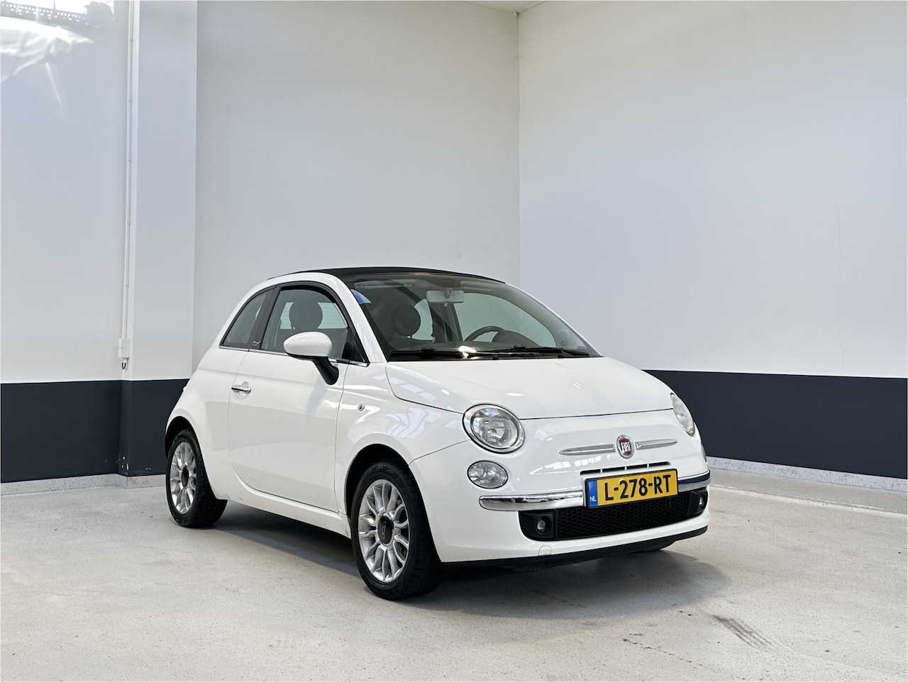 Fiat 500 - 1.2 Lounge | Cabrio | Airco | CV | LM | - AutoWereld.nl