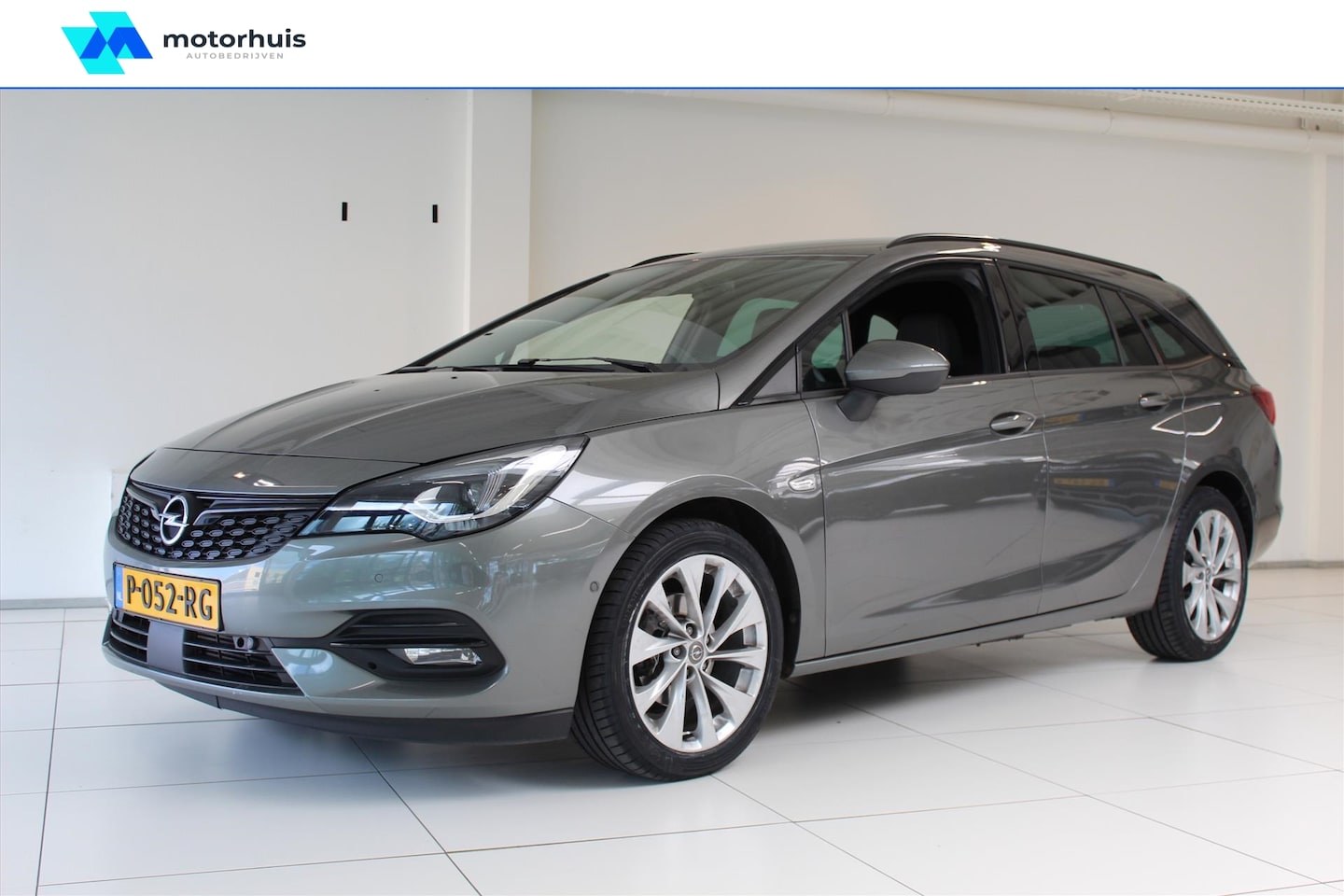 Opel Astra Sports Tourer - 1.4 Turbo 145pk Automaat Ultimate / Navi / Camera / Alcantara - AutoWereld.nl