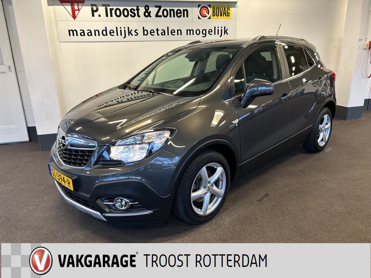 Opel Mokka - 1.4 T Cosmo | Navigatie | Achteruitrijcamera | Cruise control | Climate control | Half-Led - AutoWereld.nl