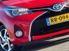 Toyota Yaris - 1.5 Hybrid Lease Automaat - Fire Red - Nav/LMV/PDC