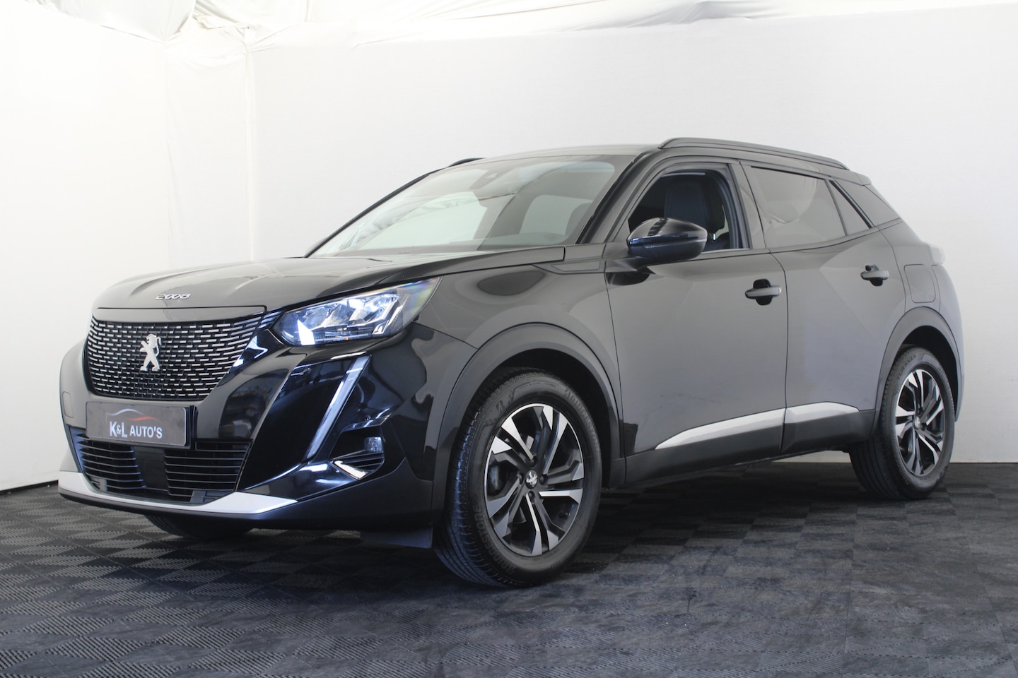 Peugeot 2008 - 1.2 PureTech Allure |Navi|Camera|Carplay| - AutoWereld.nl