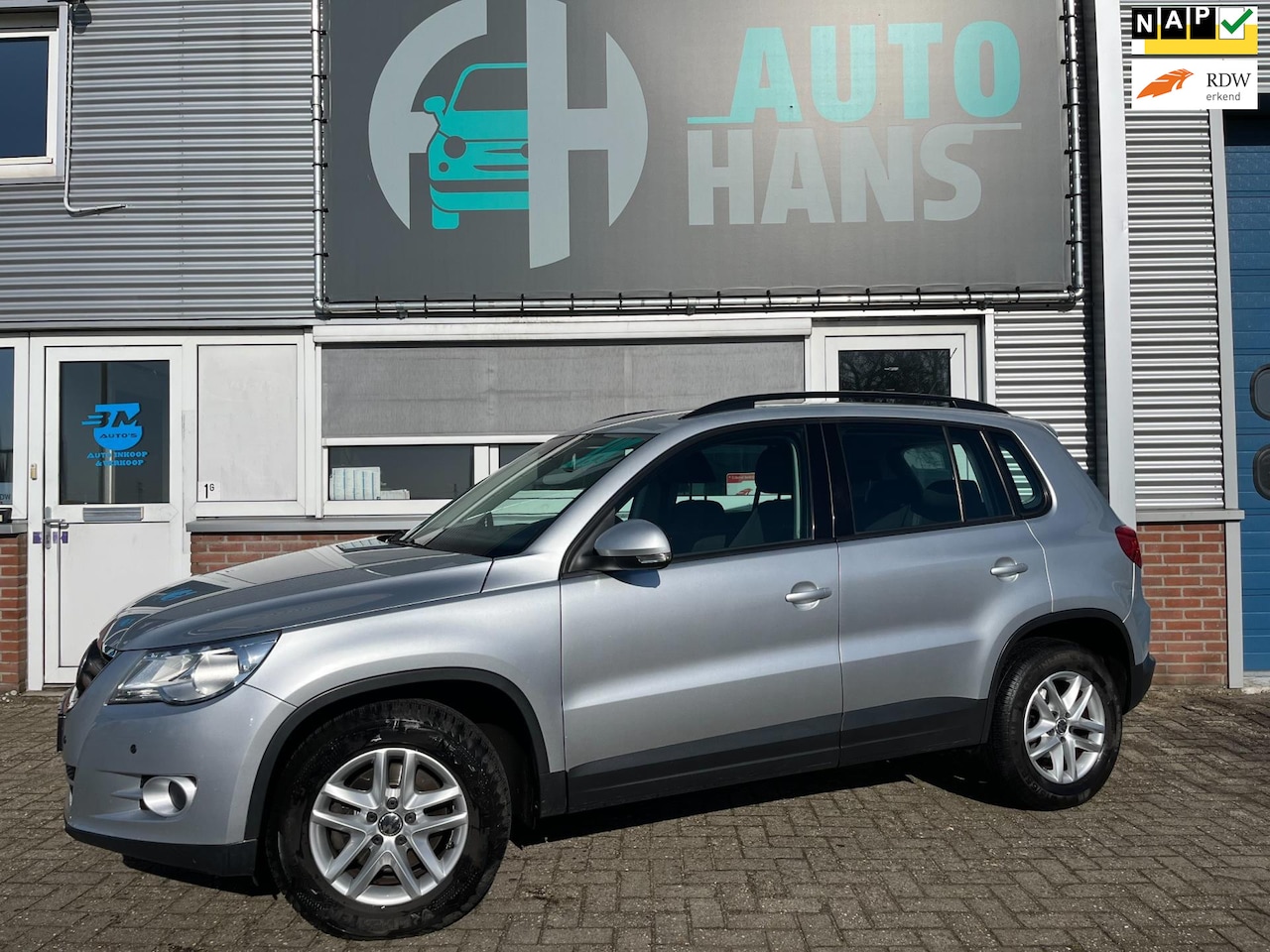 Volkswagen Tiguan - 1.4 TSI Comfort&Design 4Motion | orig NL. | topstaat | trekhaak - AutoWereld.nl