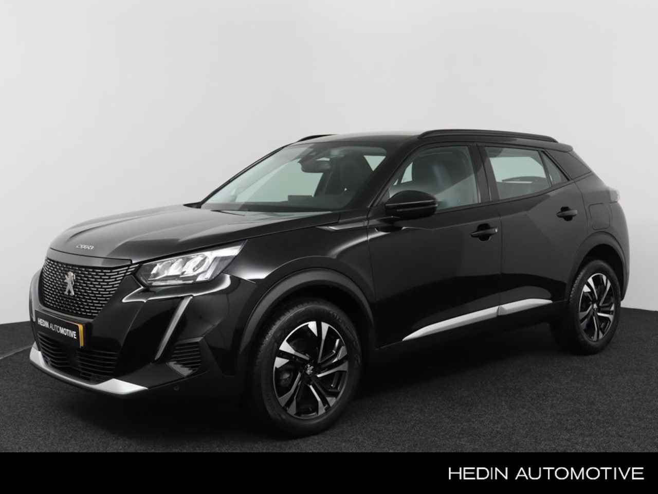 Peugeot 2008 - 1.2 130pk Allure Automaat | Climate Control | Navi via App | LM Velgen | Camera | Adaptief - AutoWereld.nl