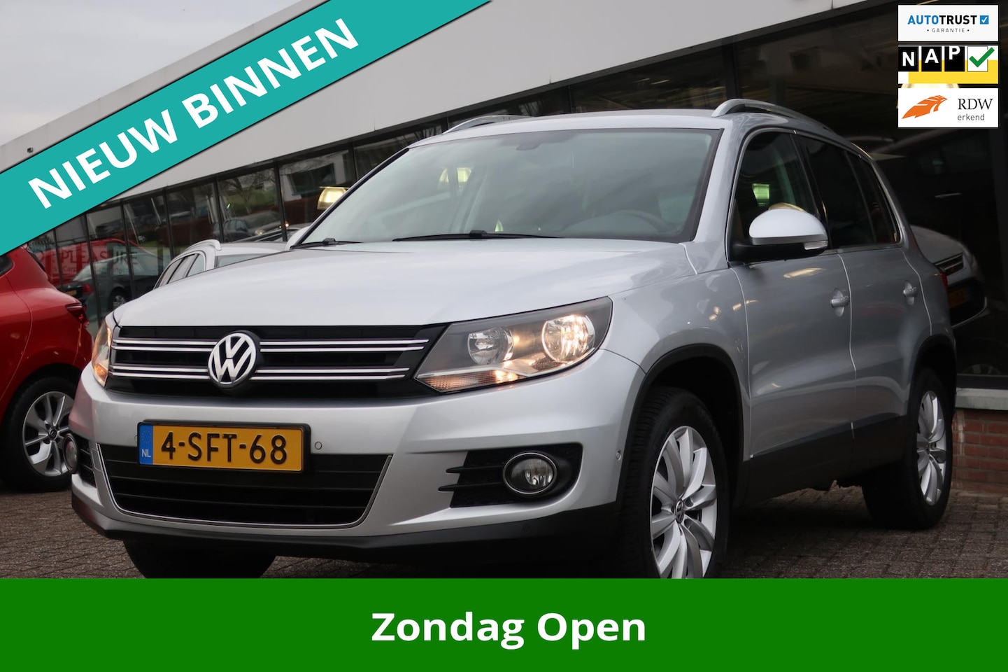 Volkswagen Tiguan - 1.4 TSI Sport&Style 1e EIG_NAVI_PDC V+A_18-INCH_NAP. - AutoWereld.nl