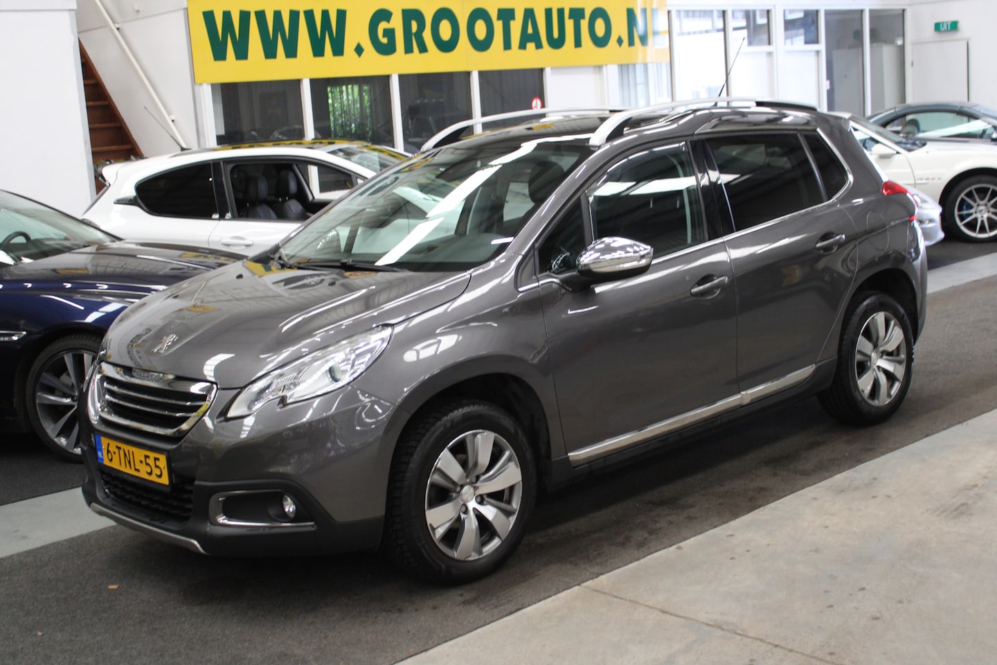 Peugeot 2008 - 1.2 VTi Allure Pack Premium Plus Automaat Panoramadak, Airco, Navi - AutoWereld.nl