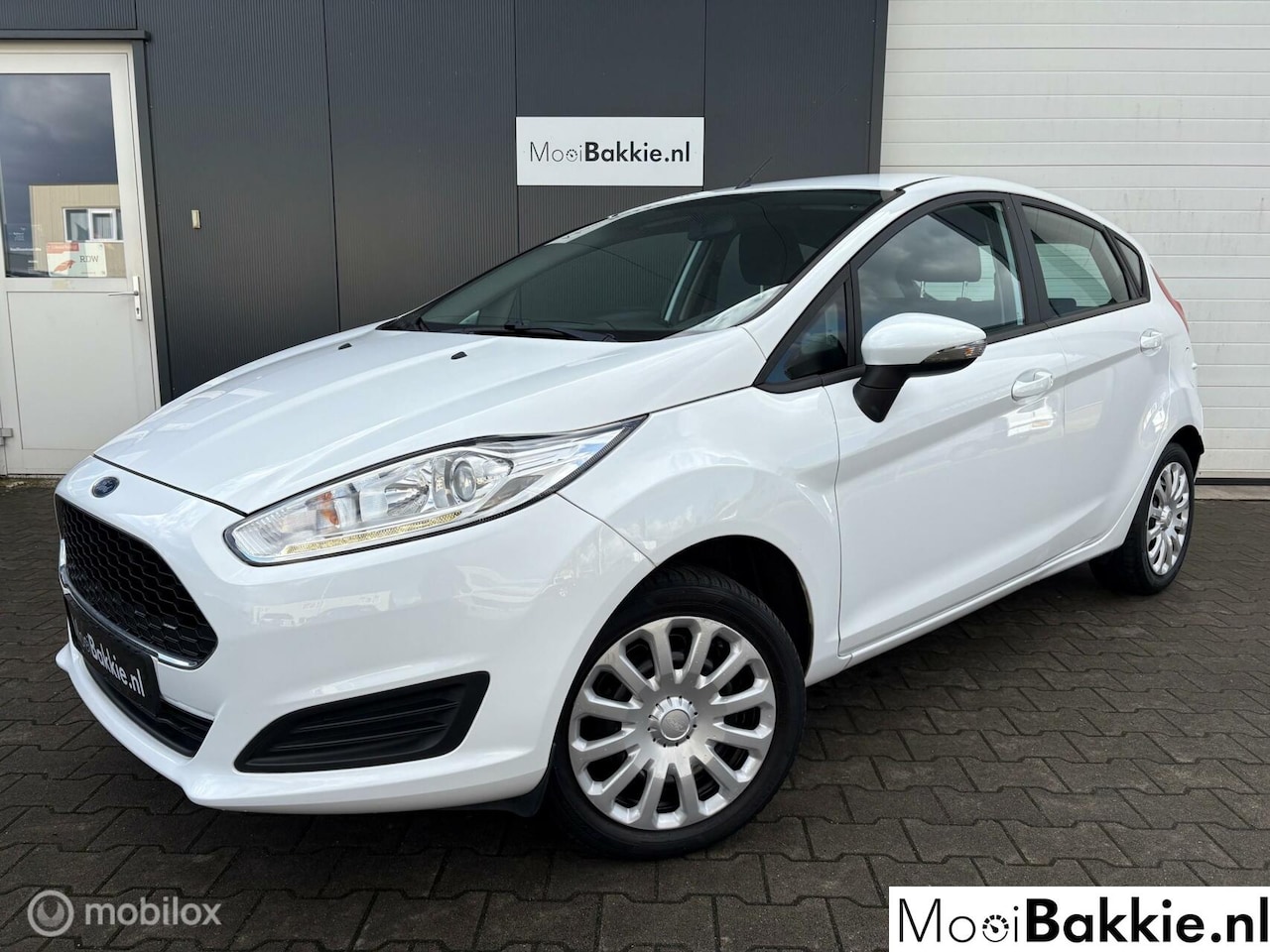 Ford Fiesta - 1.0 80pk Style Bluet. / LED / NAP / Airco / Navi - AutoWereld.nl