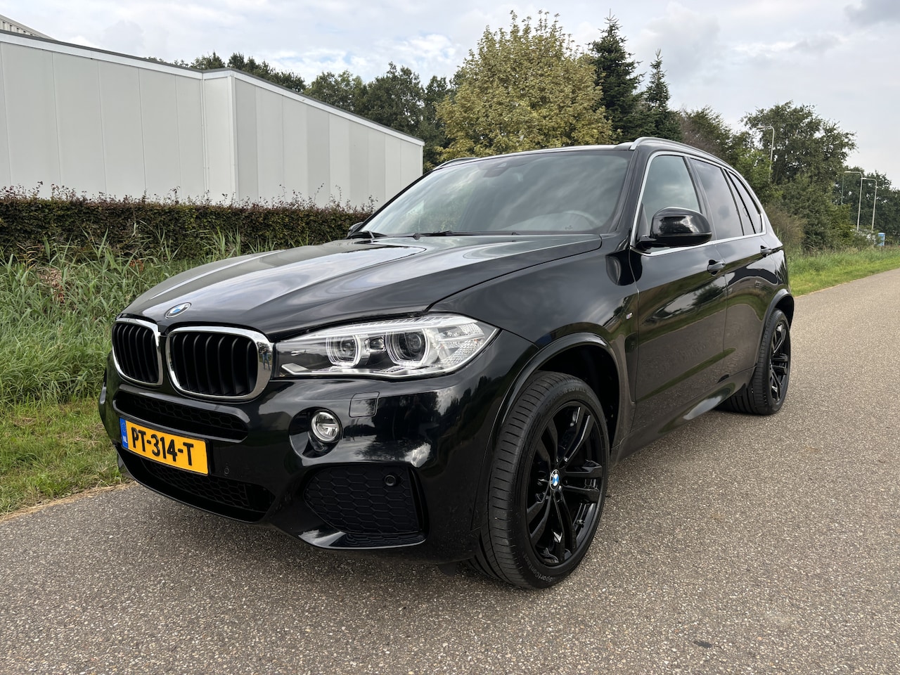 BMW X5 - xDrive30d High Executive / AUTOMAAT / M-PAKKET / NAVI / 186dkm! - AutoWereld.nl