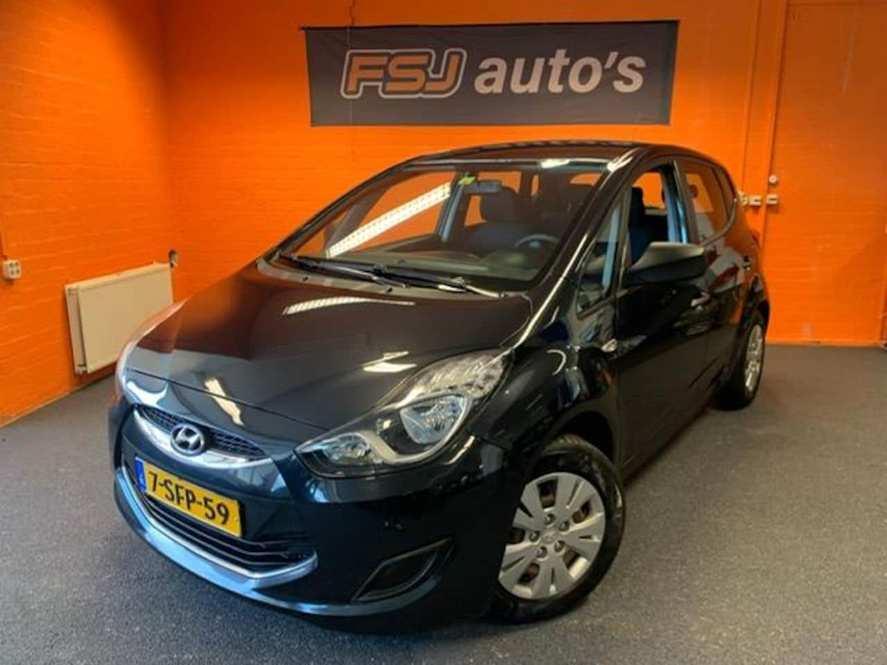 Hyundai ix20 - 1.4i i-Drive / 5 deurs / Airco / Trekhaak - AutoWereld.nl