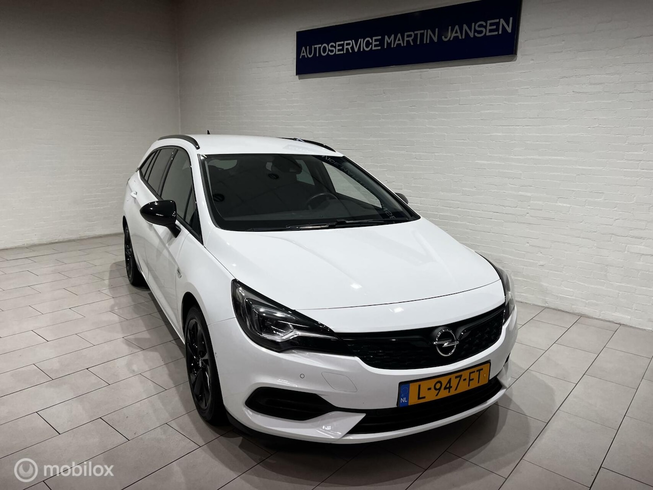 Opel Astra Sports Tourer - 1.2 Business Elegance 1.2 Business Elegance - AutoWereld.nl