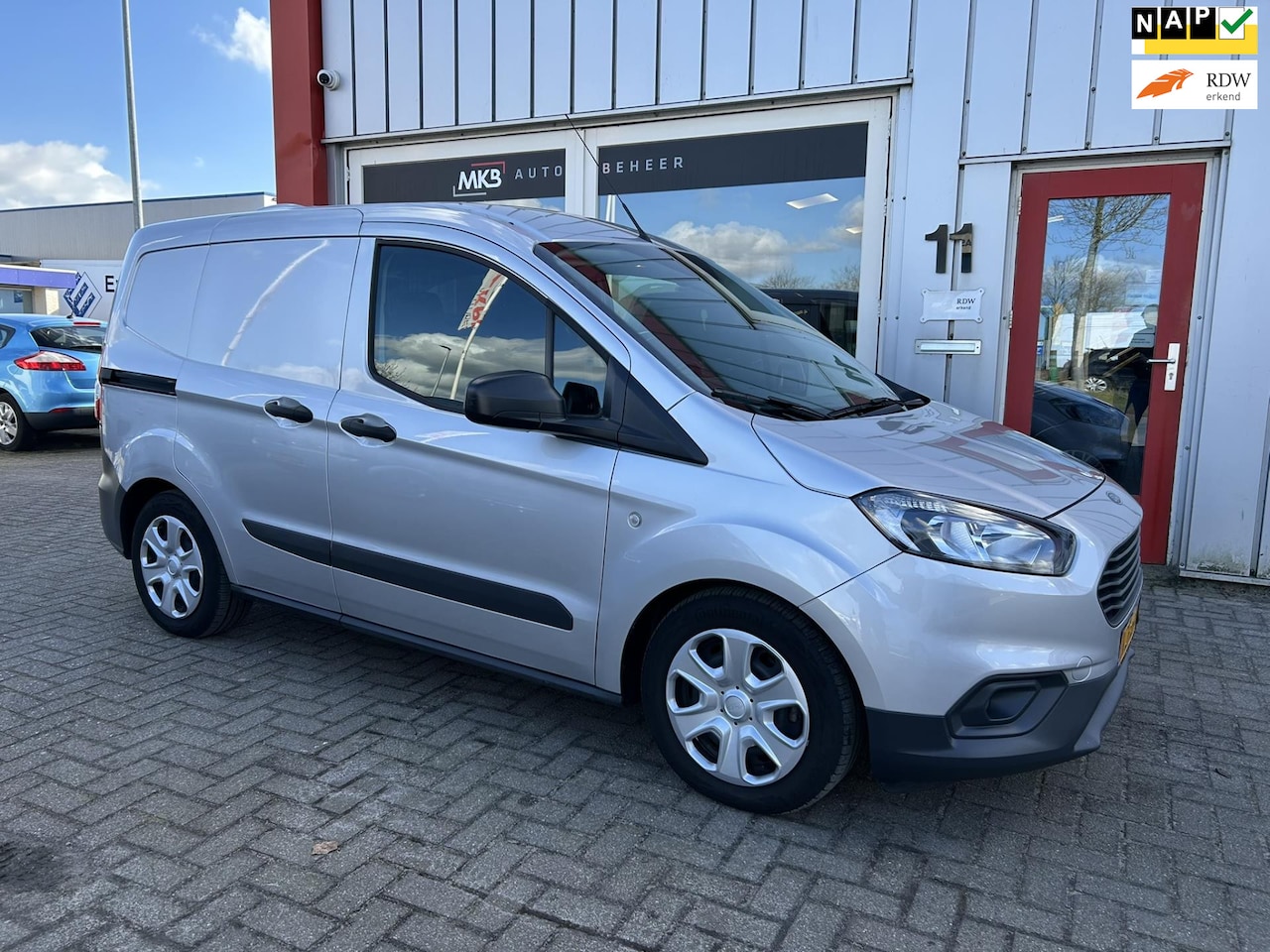 Ford Transit Courier - 1.5 TDCI HONDENAUTO Navigatie/CruiseControl - AutoWereld.nl