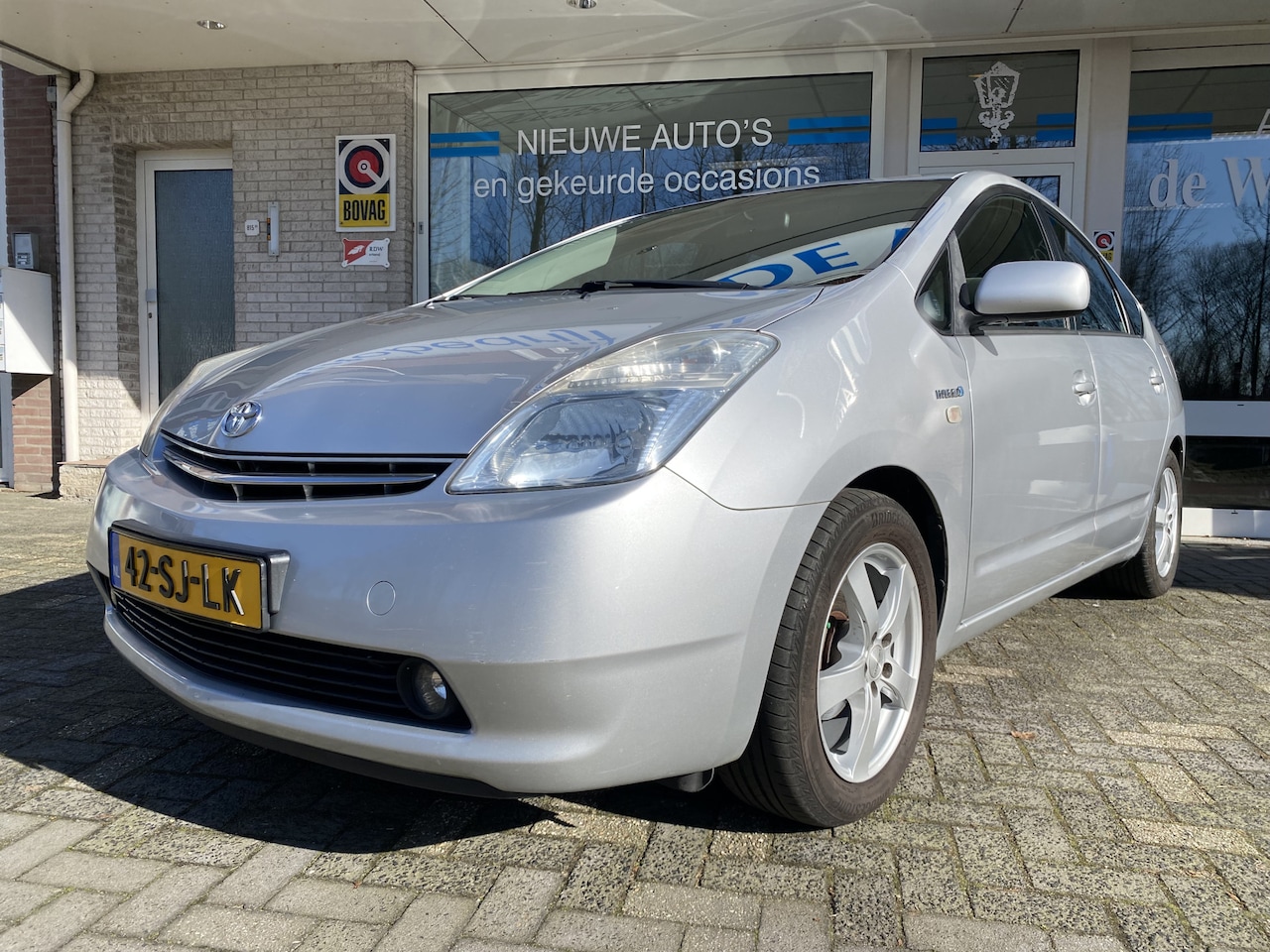 Toyota Prius - 1.5 VVT-i Tech Edition Navigatie/Achteruitrij camera/W.W. Glas/Parkeerassist./Cruise contr - AutoWereld.nl