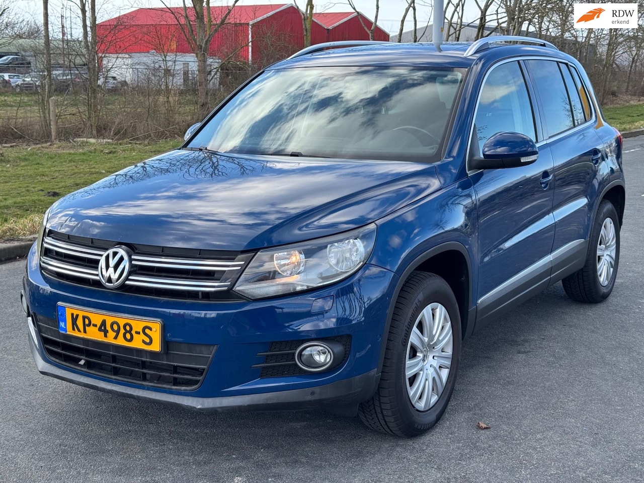 Volkswagen Tiguan - 1.4 TSI Sport&Style R-line Edition / AIRCO / NAVI - AutoWereld.nl