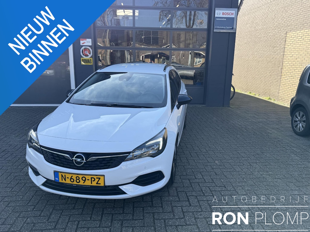 Opel Astra Sports Tourer - 1.2 Design & Tech / Airco/ Navigatie/ Apple carplay/ Cruise/ Camera/ PDC/ LMV/ Trekhaak - AutoWereld.nl