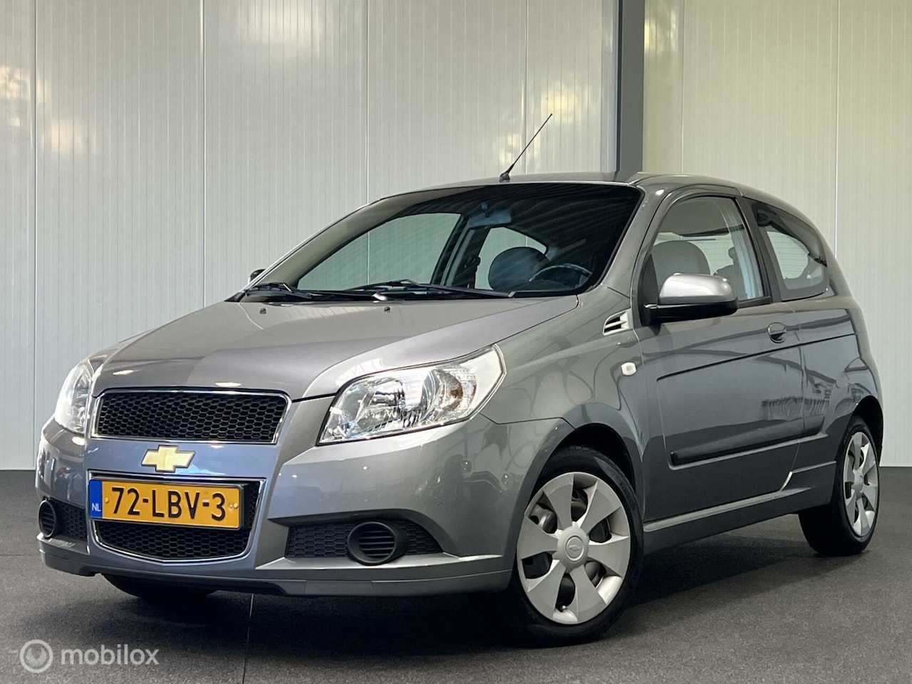 Chevrolet Aveo - 1.2 16V LS [ NAP trekhaak airco ] - AutoWereld.nl