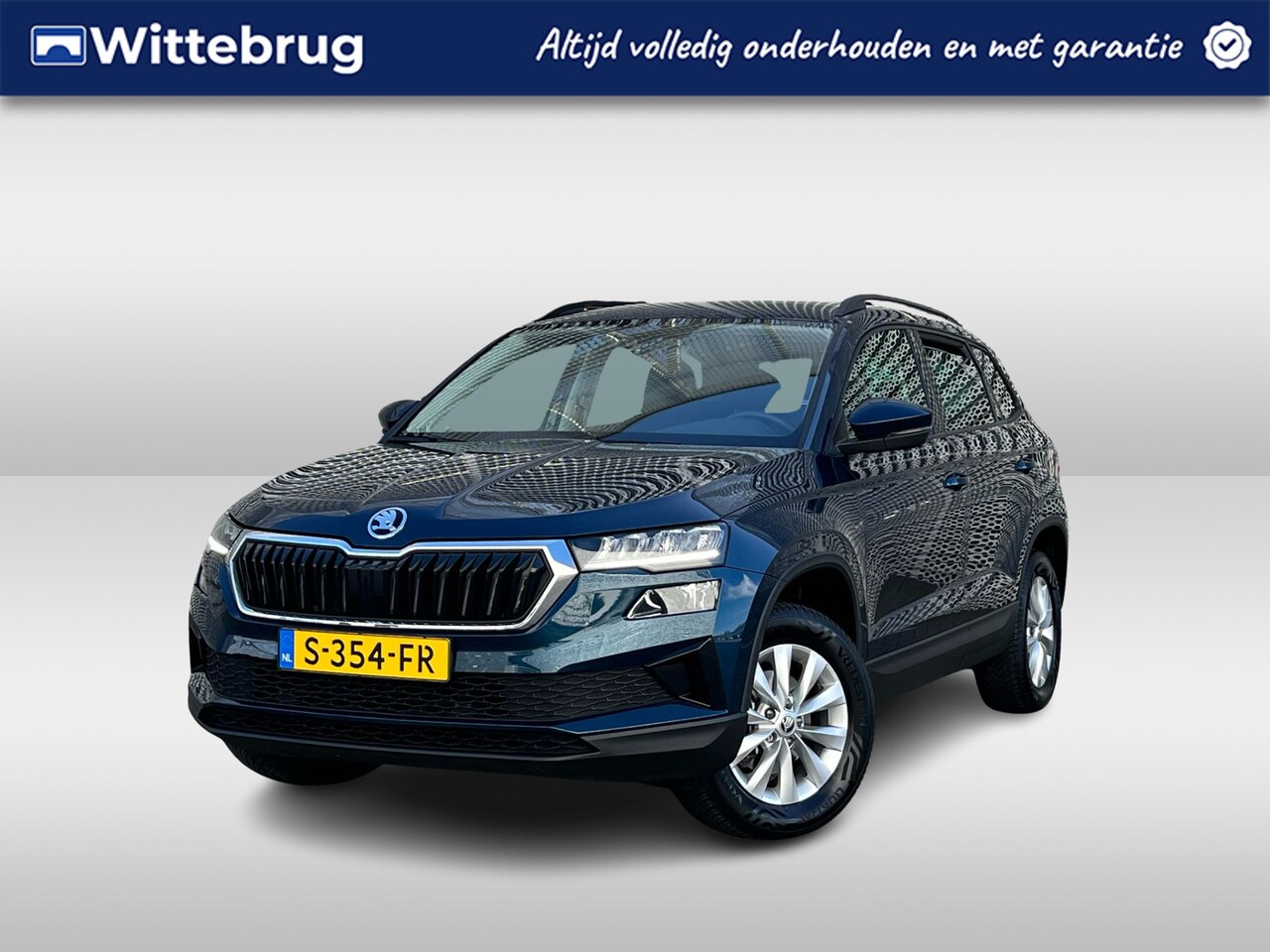 Skoda Karoq - 1.0 TSI Ambition / App connect / Cruise controle / Parkeersensoren achter / P4 - AutoWereld.nl