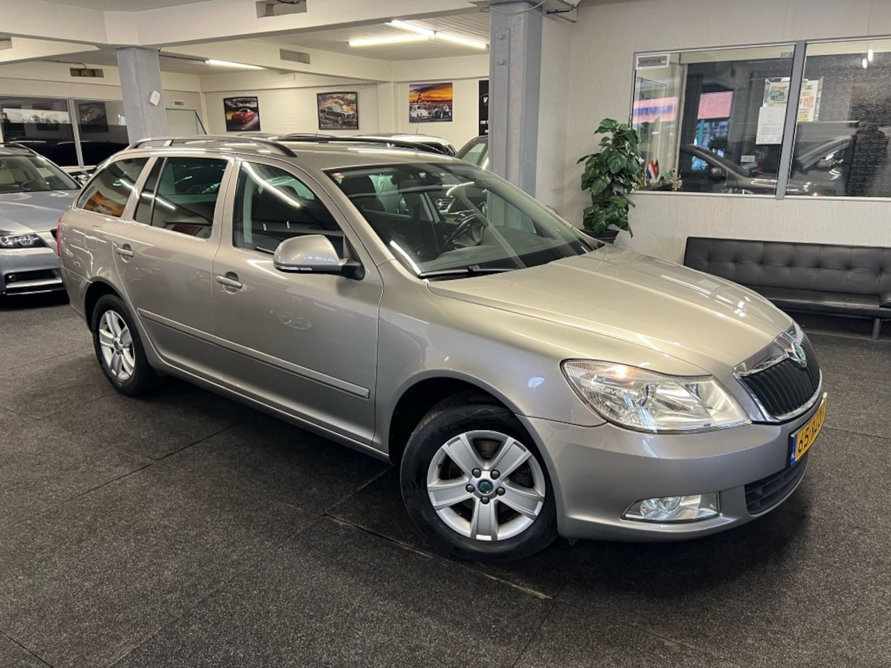 Skoda Octavia Combi - 1.2 TSI *NAP*NAVI*2011*Clima - AutoWereld.nl