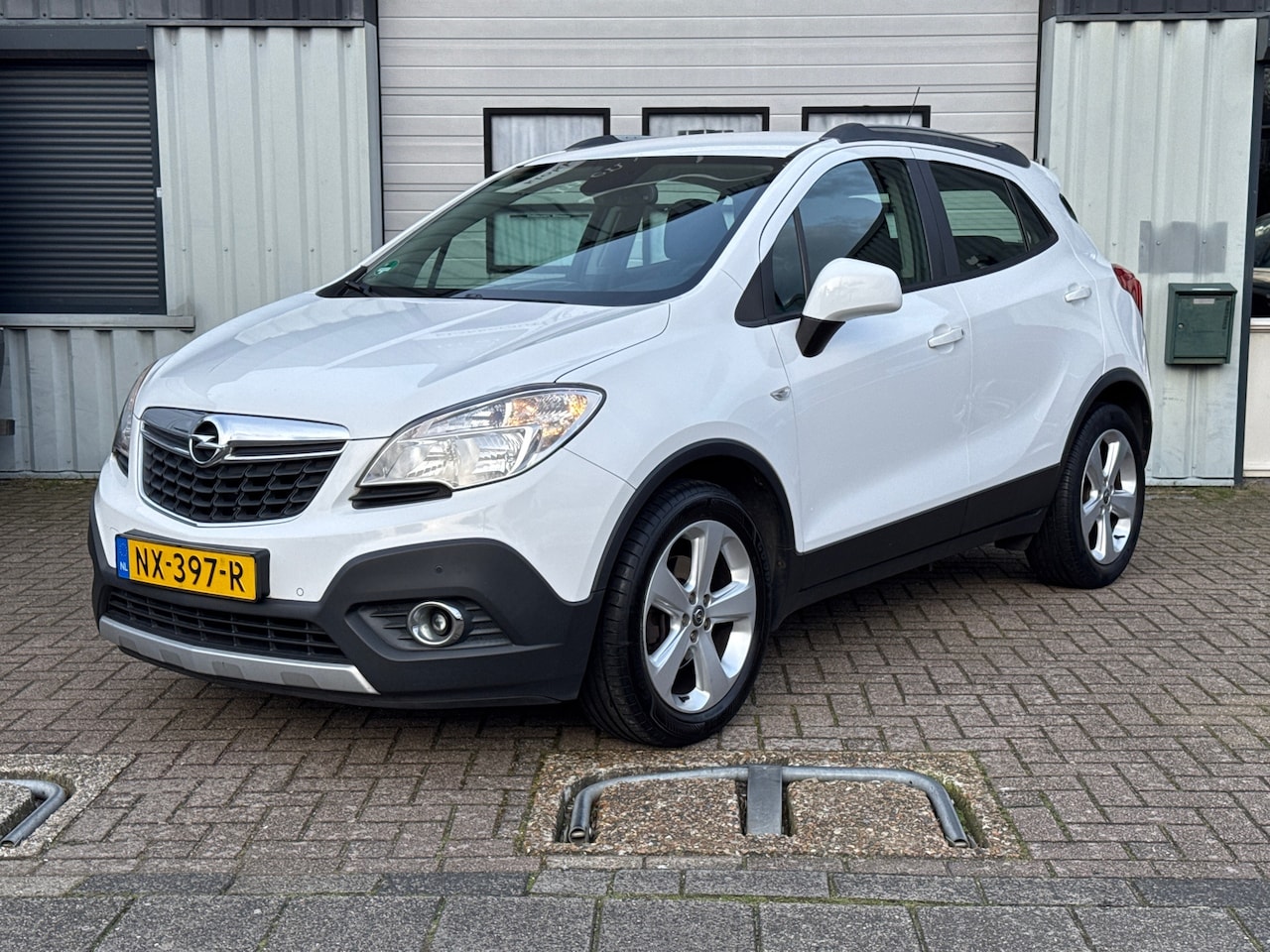 Opel Mokka - 1.6 Cosmo Airco | Clima | Cruise | Stuur-/stoelverwarming - AutoWereld.nl