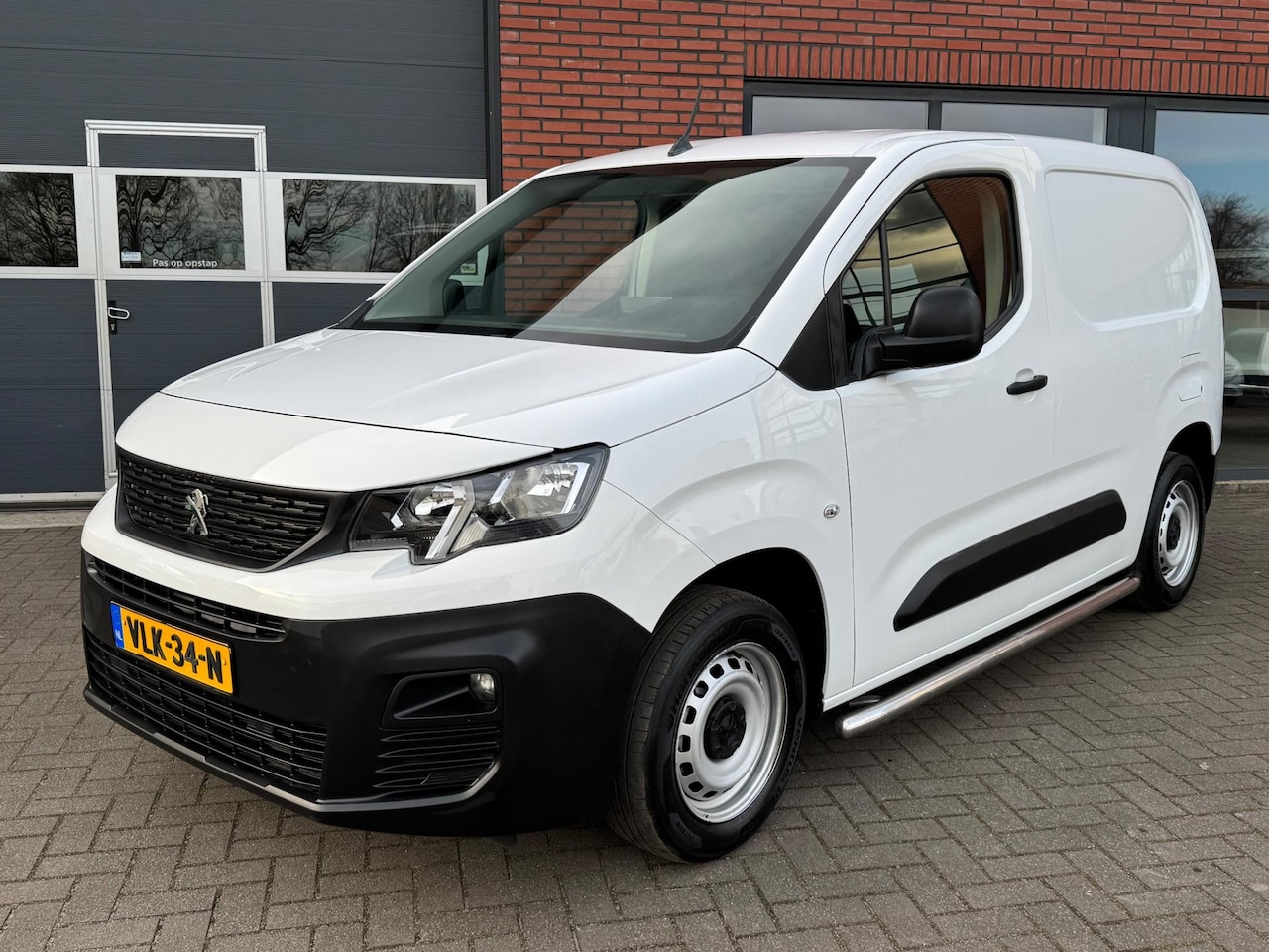 Peugeot Partner - 1.5 BlueHDI Airco Cruise Navi Premium - AutoWereld.nl