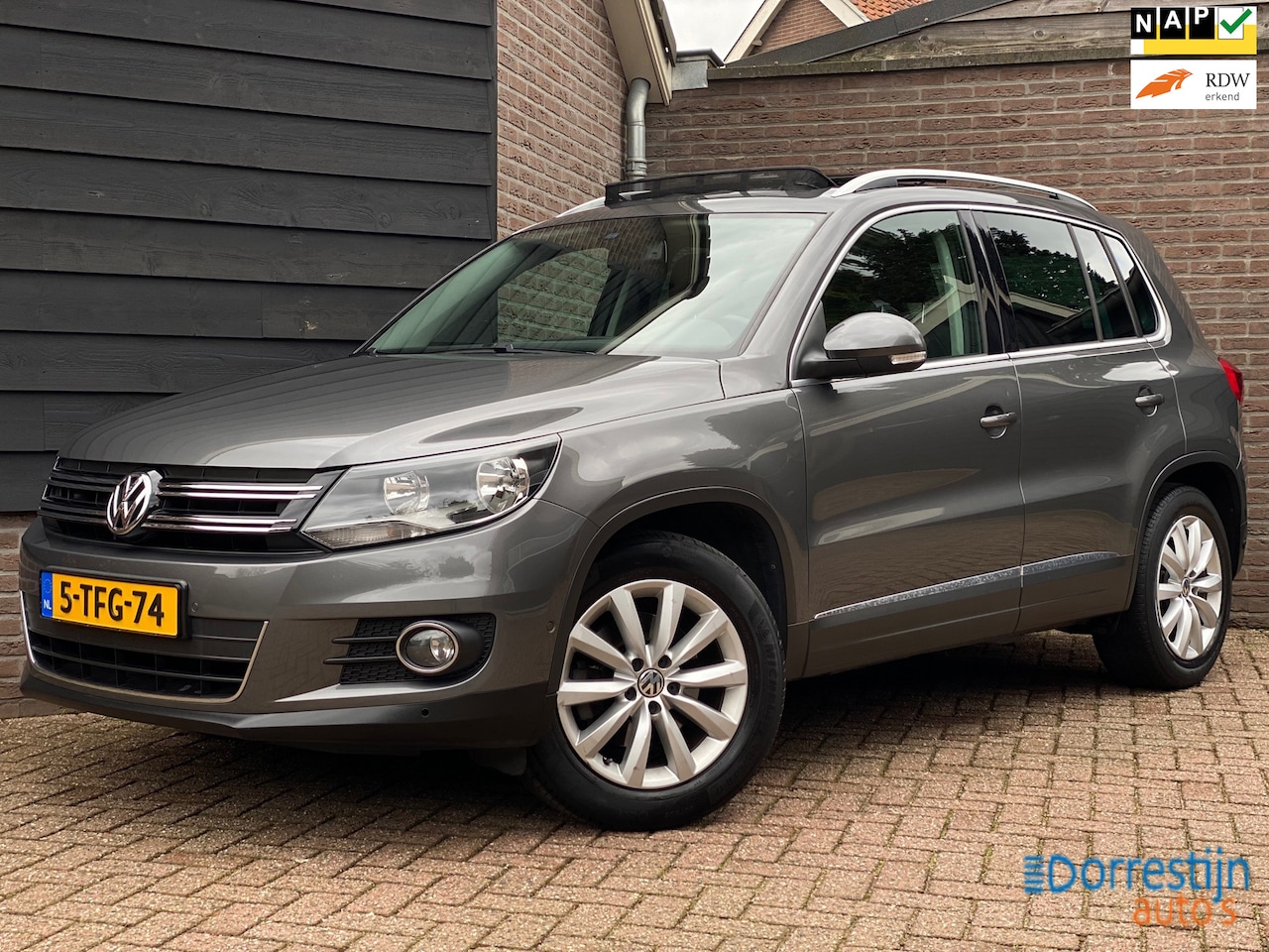 Volkswagen Tiguan - 1.4 TSI Sport&Style Panorama/Trekhaak/PDC/Cruise/NAP - AutoWereld.nl