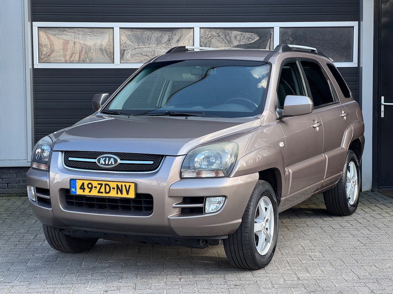 Kia Sportage - 2.0 CVVT Comfort 2.0 CVVT Comfort - AutoWereld.nl