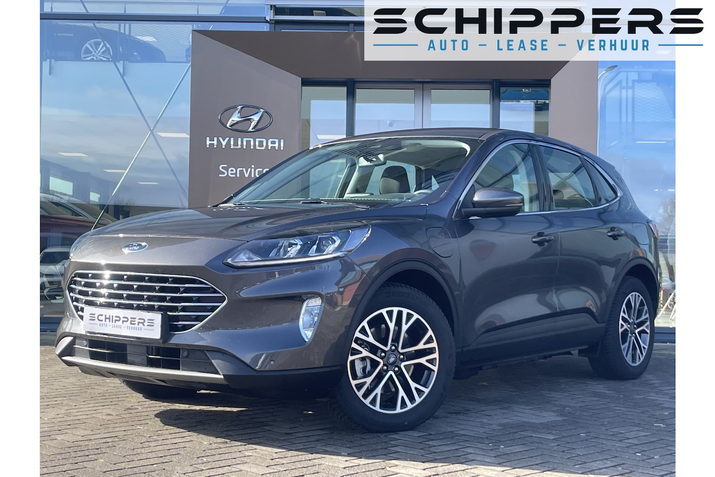 Ford Kuga - 2.5 PHEV Titanium 2.5 PHEV Titanium - AutoWereld.nl