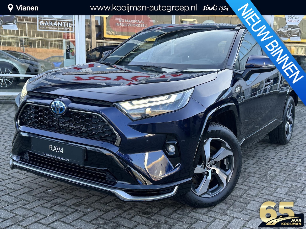 Toyota RAV4 - 2.5 Plug-in Hybrid AWD Business | Volledig lederen bekleding | Elek. inklapbare buitenspie - AutoWereld.nl