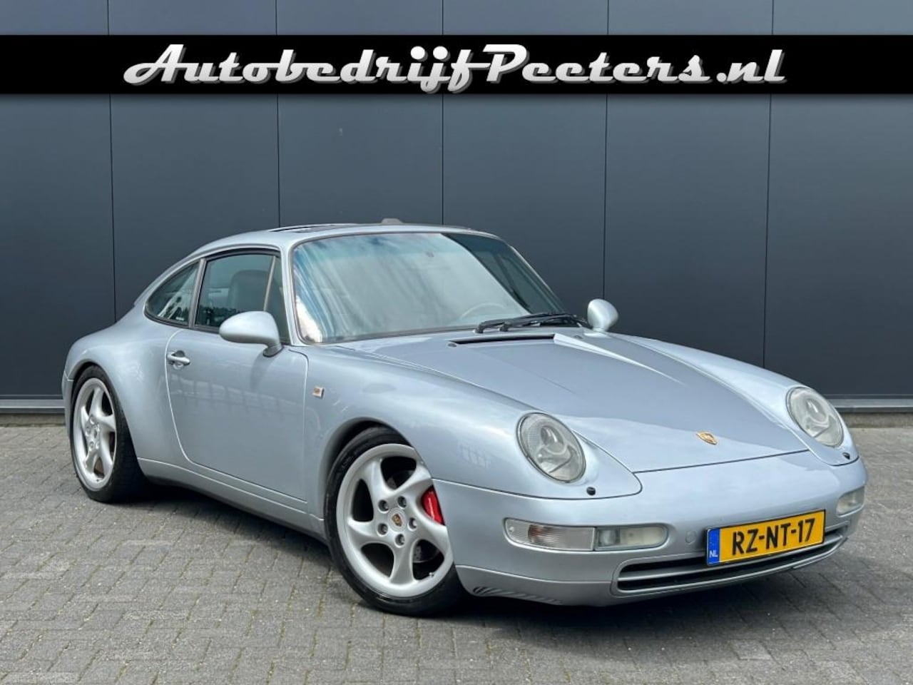 Porsche 911 - 993 3.6 Carrera Bj.1994  Navi Leder Voll.gedocumenteerd - AutoWereld.nl