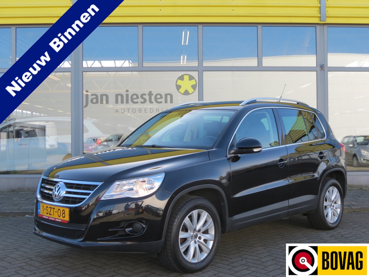 Volkswagen Tiguan - 2.0 TSI Sport&Style 4Motion -170pk- Automaat | Trekhaak | Leder | Rijklaarprijs incl. 1 ja - AutoWereld.nl