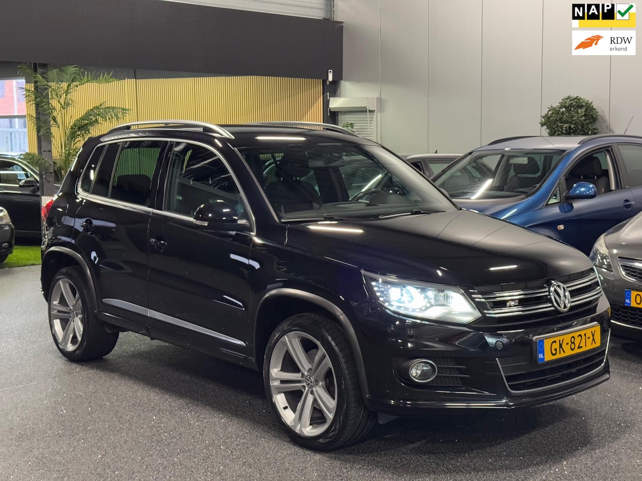 Volkswagen Tiguan - 1.4 TSI R-Line | Bi-Xenon | Carplay | Dynaudio | Camera - AutoWereld.nl