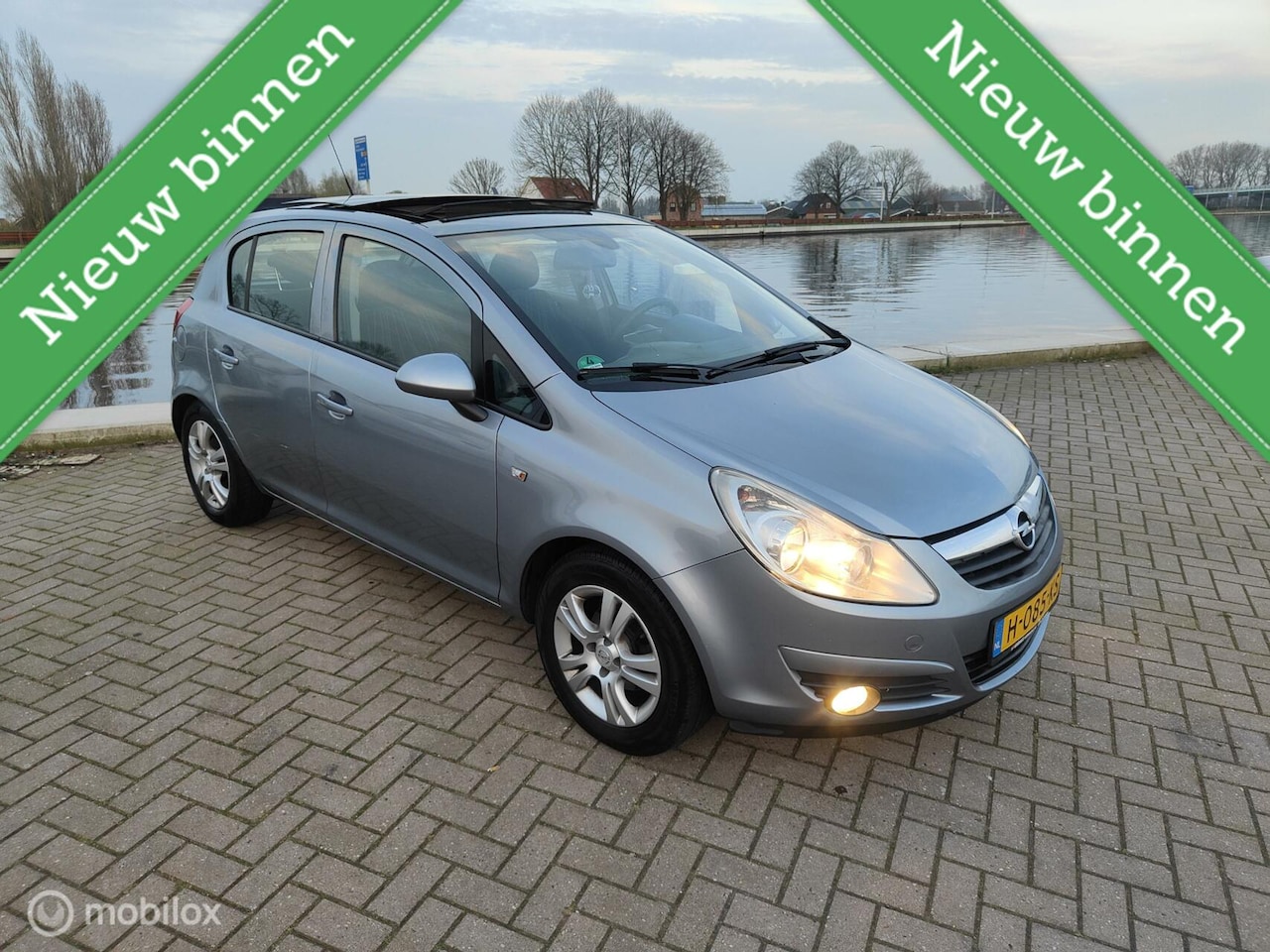 Opel Corsa - 1.2-16V Selection PANORAMA DAK, APK,AIRCO,LM VELG - AutoWereld.nl