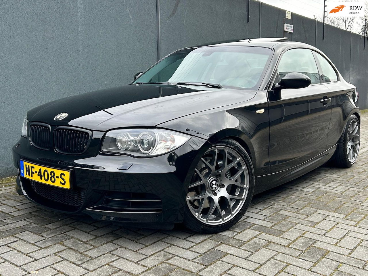 BMW 1-serie Coupé - 135i High Executive 306 PK / Zeer Net / APK - AutoWereld.nl