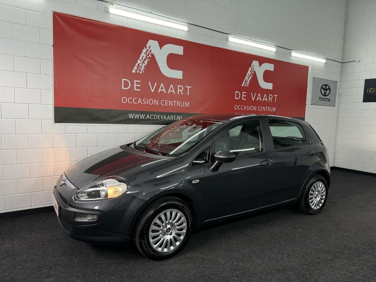 Fiat Punto Evo - 1.2 Active - 1EIGENAAR/5DRS/AIRCO/CRUISE/NAP - AutoWereld.nl