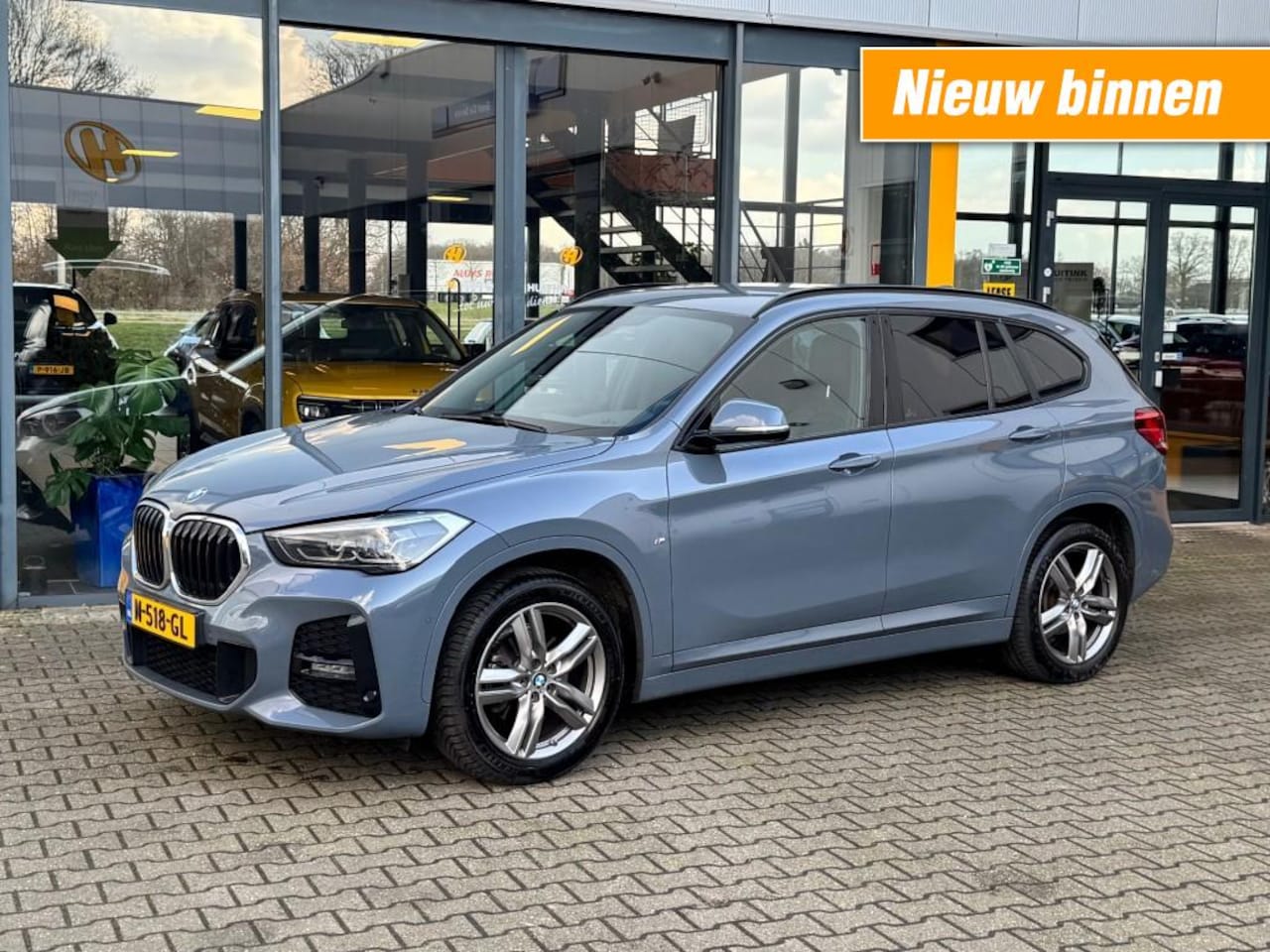 BMW X1 - sDrive18i High Executive - navi - stoelverwarming - trekhaak - AutoWereld.nl