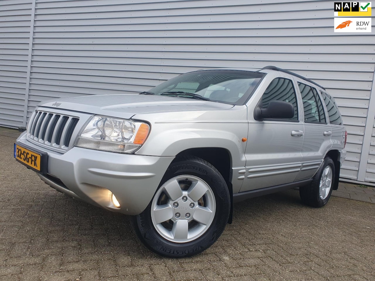 Jeep Grand Cherokee - 4.7i V8 Limited Clima/Cruise/Leder - AutoWereld.nl