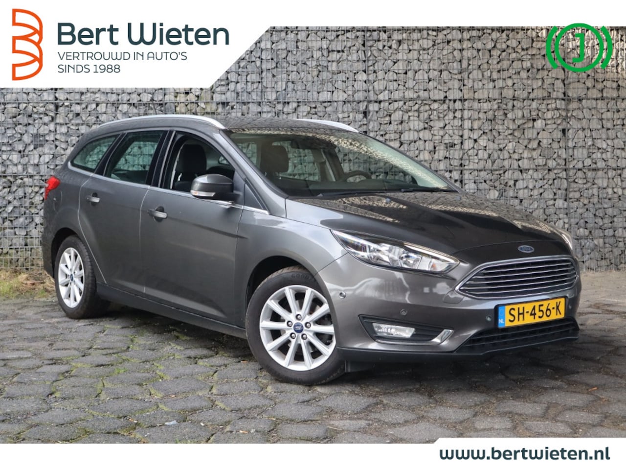 Ford Focus Wagon - 1.0 Titanium | Geen import | Navi | Cruise - AutoWereld.nl