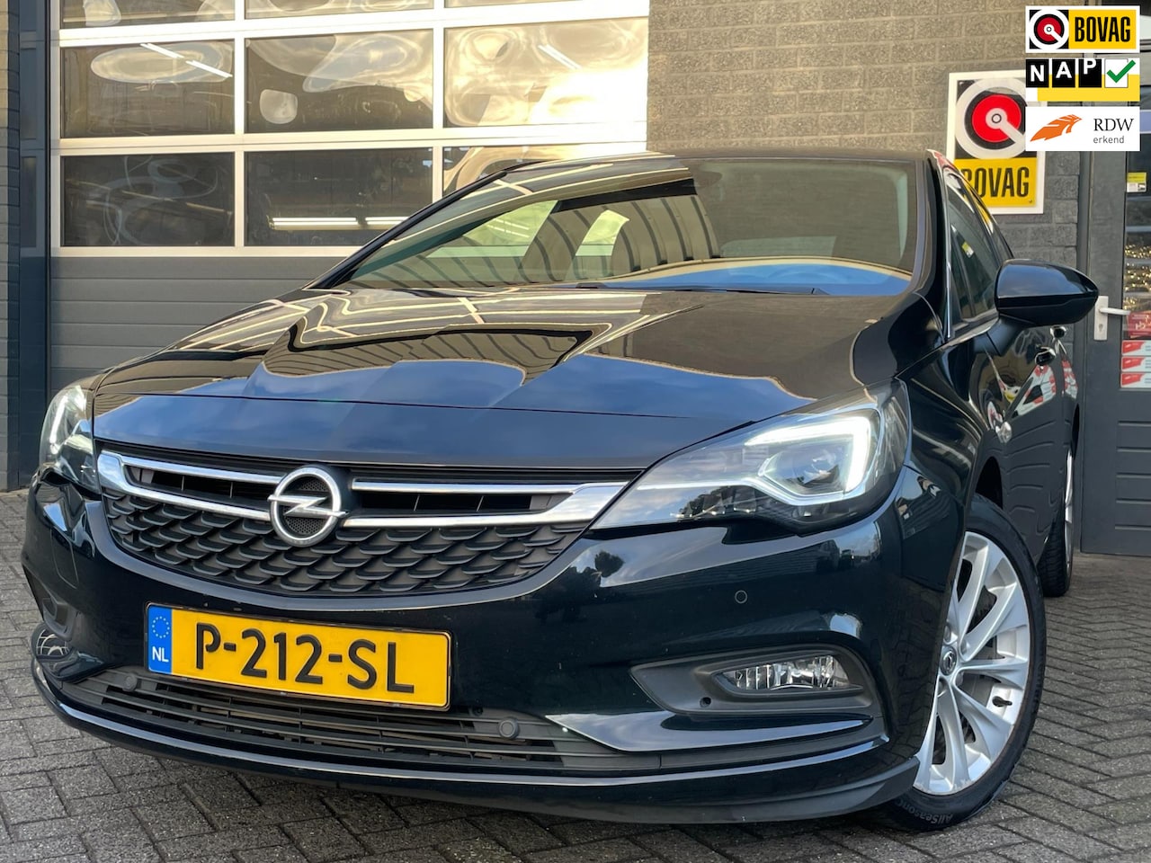 Opel Astra - 1.4 Turbo S/S|NAVI|CARPLAY|CAMERA|CLIMATE|KEYLES|1/2 LEDER - AutoWereld.nl