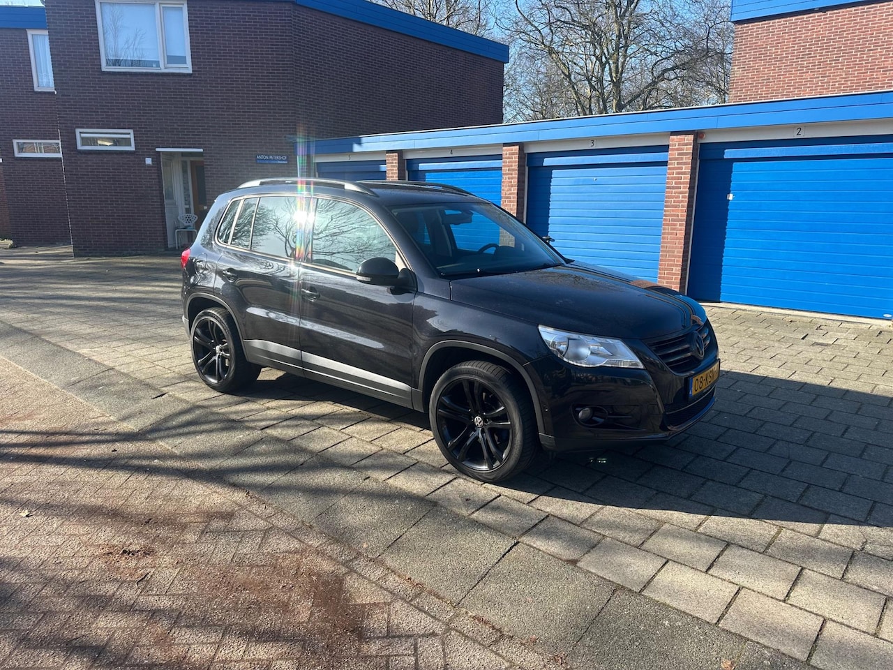 Volkswagen Tiguan - 1.4 TSI Comfort&Design Cruise Camera Black Magic - AutoWereld.nl