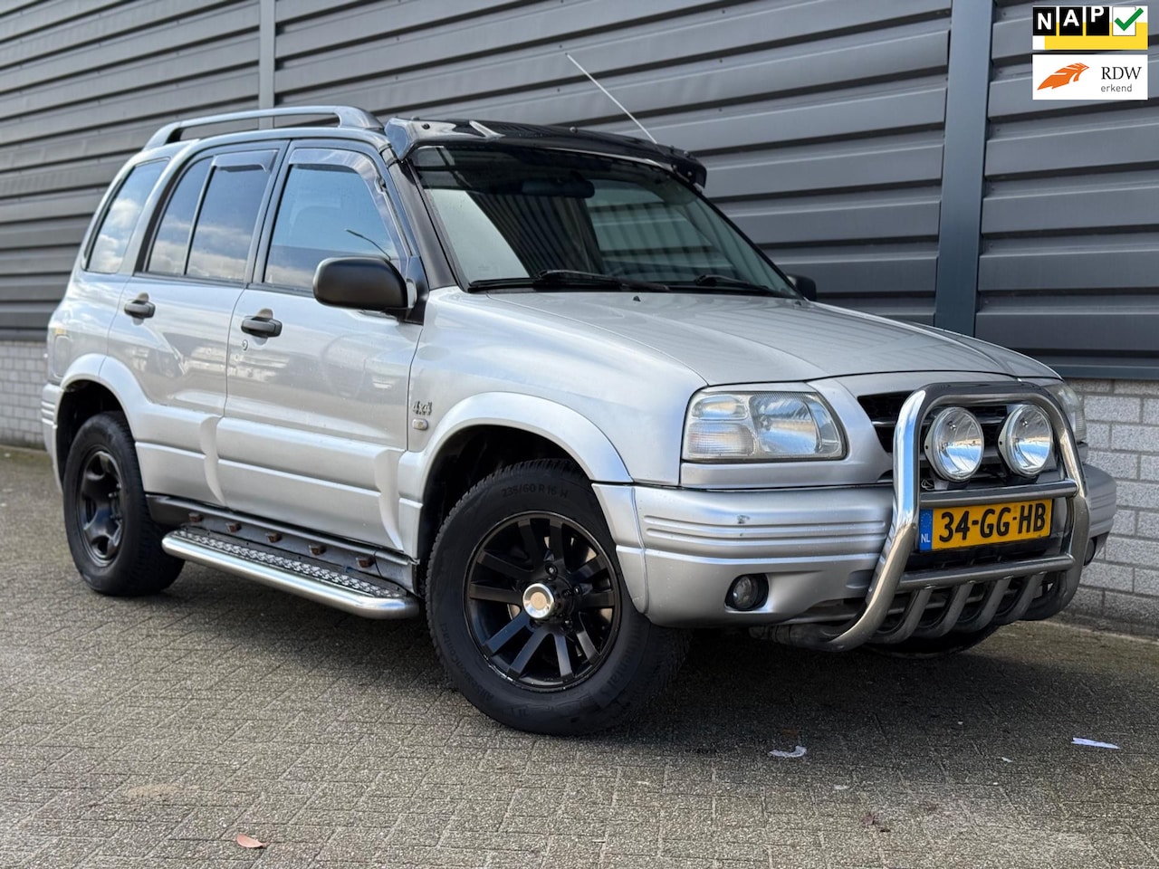 Suzuki Grand Vitara - 2.5 V6 AUTOMAAT 4X4 AIRCO CRUISE - AutoWereld.nl