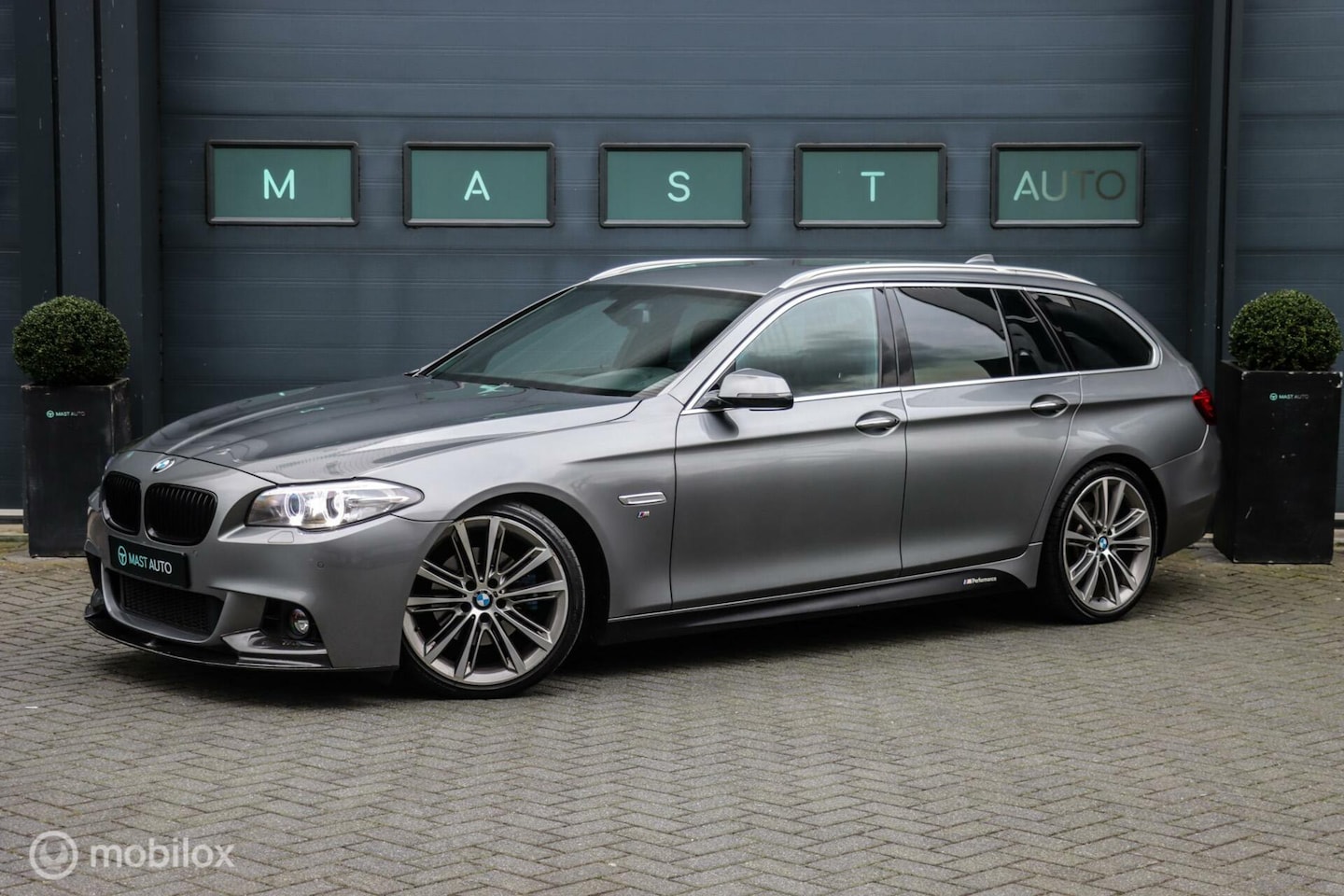 BMW 5-serie Touring - 520i M Sport|NAP|PDC|NAVI| - AutoWereld.nl