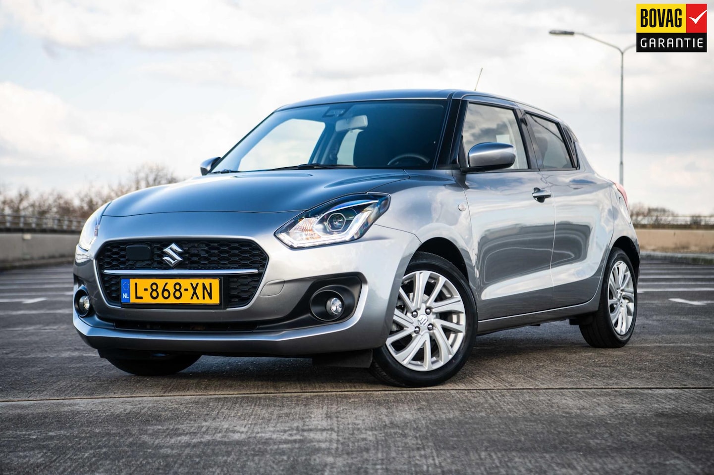 Suzuki Swift - 1.2 Select Smart Hybrid | Airco | Trekhaak | Adaptieve Cruise Control | Camera | Stoelverw - AutoWereld.nl