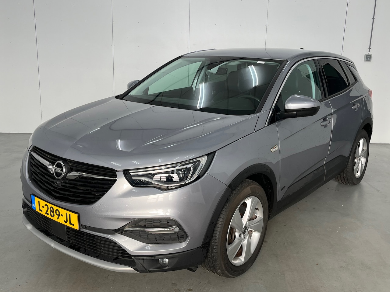 Opel Grandland X - 1.6 Turbo Hybrid Business Elegance / Apple Carplay/Android Auto / Camera / Stoelverwarming - AutoWereld.nl