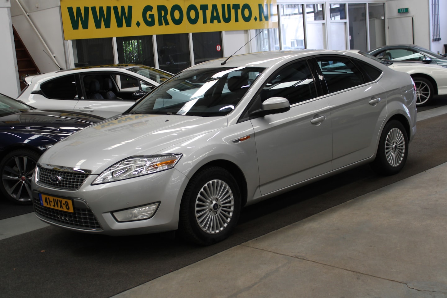 Ford Mondeo - 2.0-16V Limited 90.273km NAP, Airco, Cruise control, Navi - AutoWereld.nl