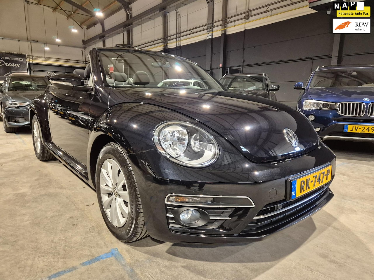 Volkswagen Beetle Cabriolet - 1.2 TSI Exclusive Series - Navigatie - Cruise - PDC - Stoelverwarming - Windscherm - 54000 - AutoWereld.nl