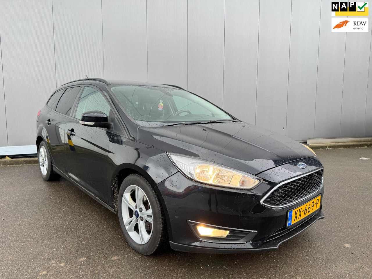 Ford Focus Wagon - 1.5 TDCI Titanium Edition autm navi clima - AutoWereld.nl