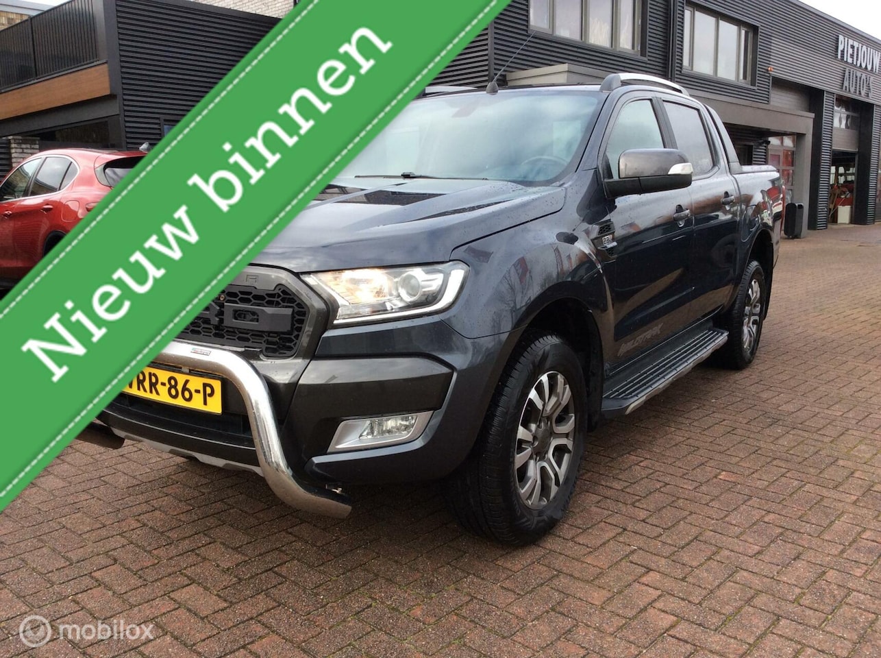 Ford Ranger - 2.2 TDCi Limited Supercab Wildtrak Automaat Boekjes - AutoWereld.nl