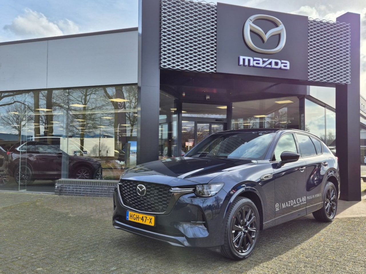 Mazda CX-60 - E- SKYACTIV- PHEV 327 8AT AWD HOMURA / Business Edition - AutoWereld.nl