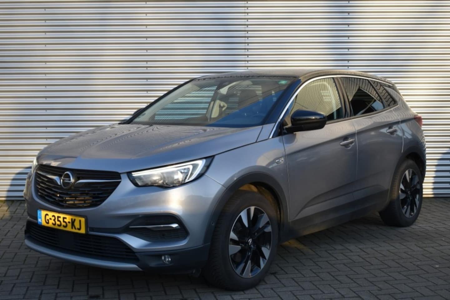 Opel Grandland X - 1.2 AUT. TURBO / NAVI + APP CONNECT / P.CAM. / SPORTSTOELEN - AutoWereld.nl