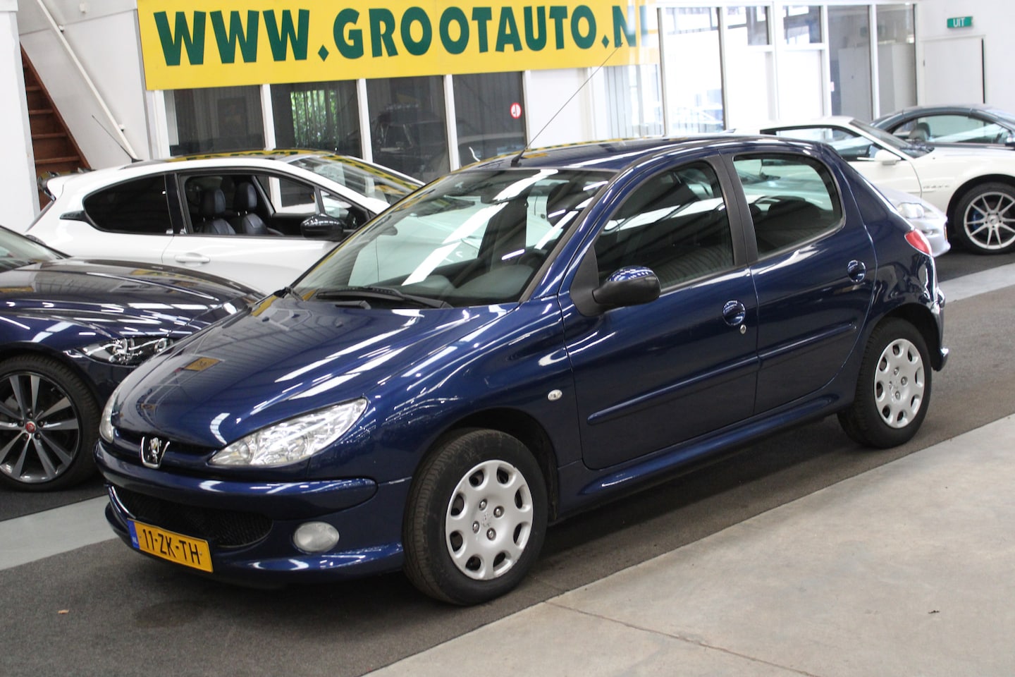 Peugeot 206 - 1.4 Forever 76.325km NAP, Airco, Stuurbekrachtiging - AutoWereld.nl