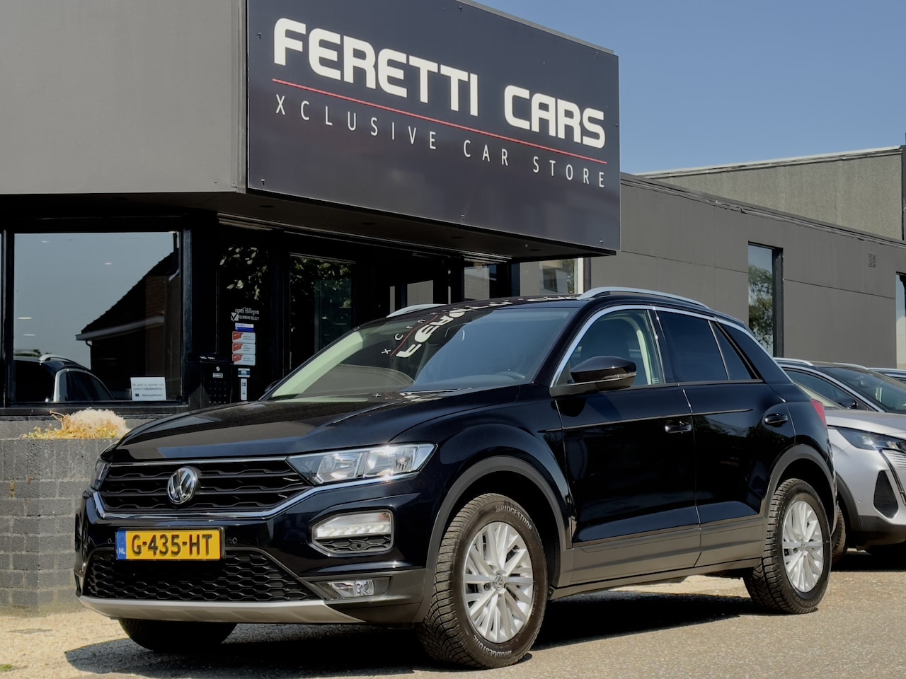 Volkswagen T-Roc - 1.5 TSI AUT7 STYLE NAVI CAMERA APPLE-CARPLAY LED LMV PDC - AutoWereld.nl